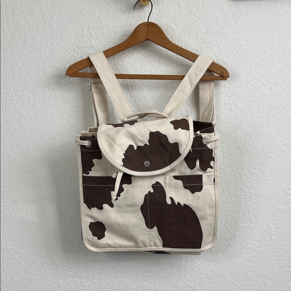 BAGGU Canvas Cow Print Backpack in Cream and Brown